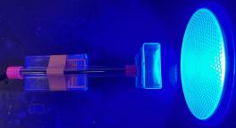 Vernier light sensor, Tic Tac sample holders, and blue light source used to study the photochemical decolorization of curcumin.